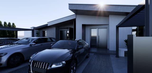 Moderná kancelária v minimalistickom štýle s elegantnými pracovnými stolmi a prírodnými materiálmi.