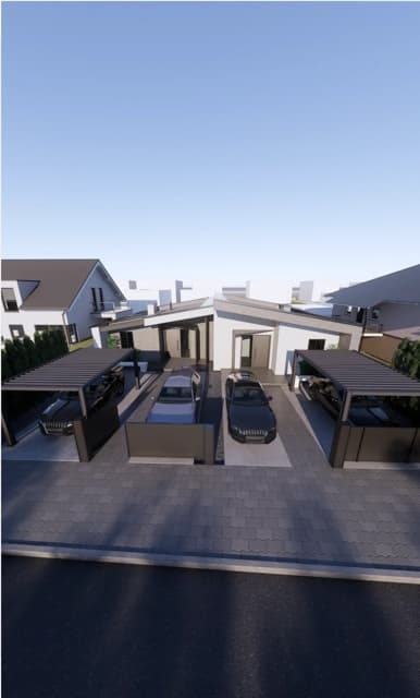 Moderná kancelária v minimalistickom štýle s elegantnými pracovnými stolmi a prírodnými materiálmi.